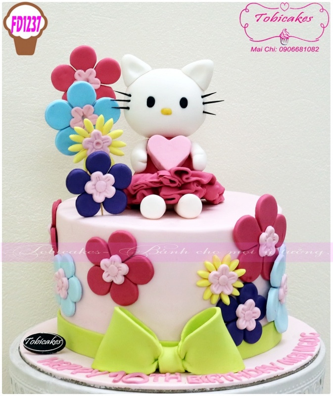 [FD1237] BÁNH SINH NHẬT TRANG TRÍ MÈO KITTY NGỒI GIỮA CÁC BÔNG HOA SẶC SỠ